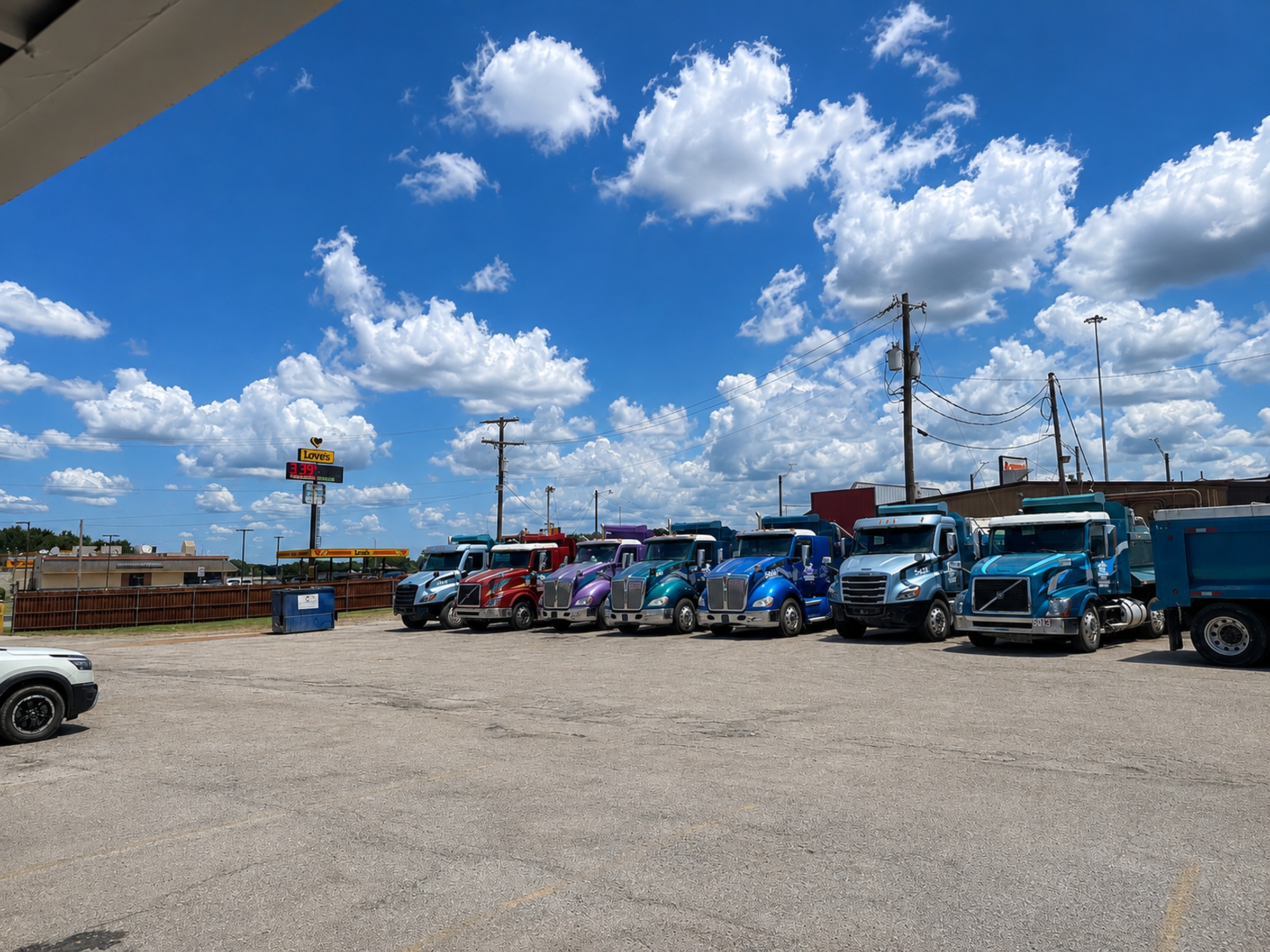 On-site truck and trailer parking at Apollo Lodge in Fairfield, TX